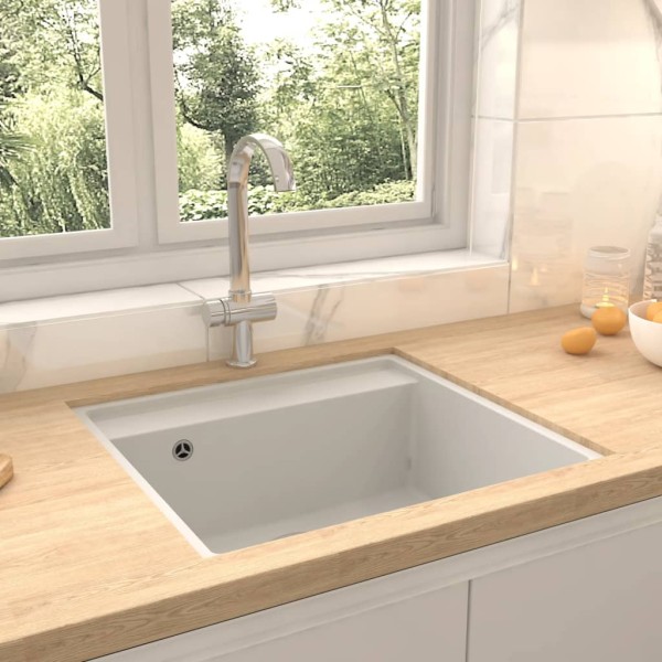 Kitchen sink with hole from overfilling, white, granite