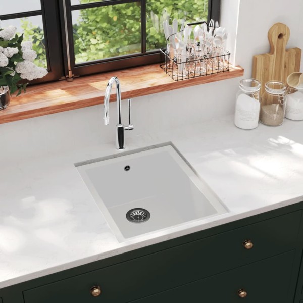 Kitchen sink with hole from overfilling, white, granite