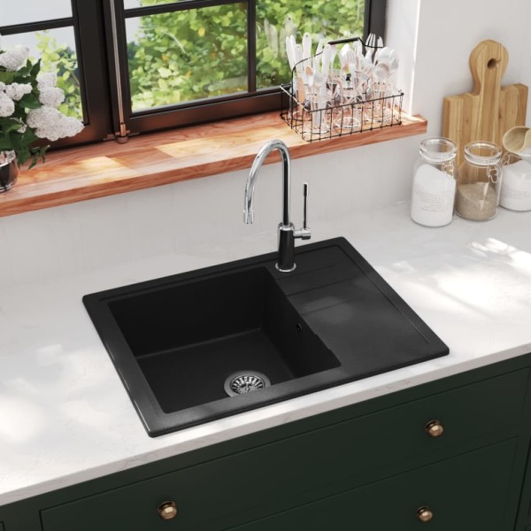 Kitchen sink with hole from overfilling, black, granite