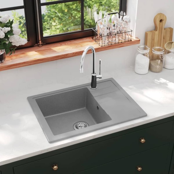 Kitchen with an opening from overfilling, gray, granite