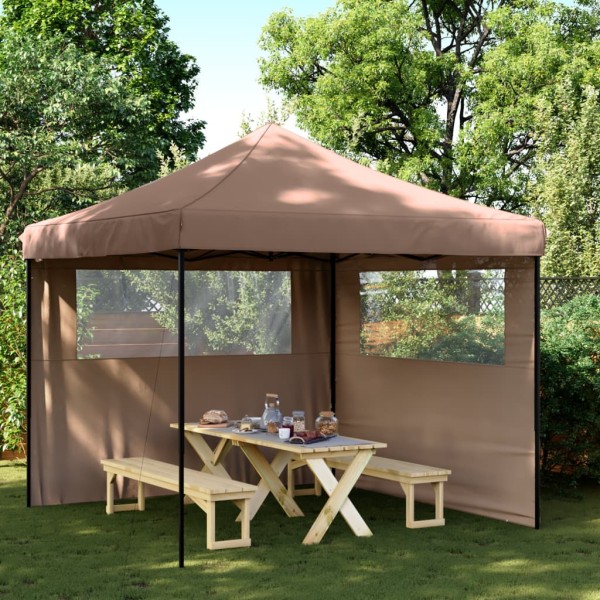 A commemorative tent with 2 side walls, brown