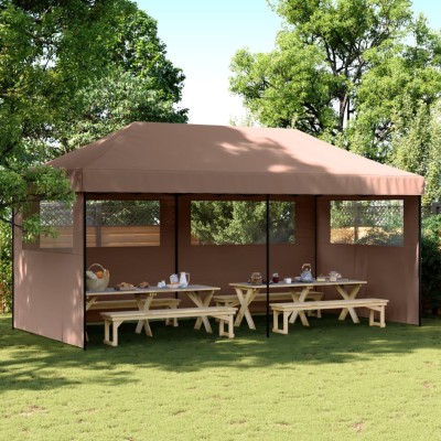 A wooden tent with 3 side...