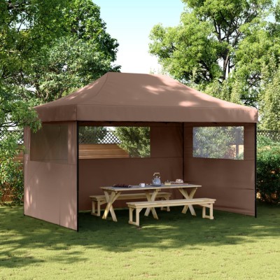 A wooden tent with 3 side...