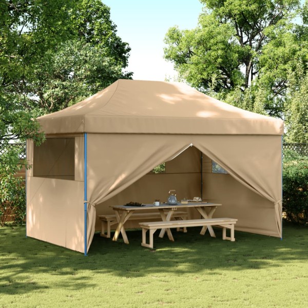 A commemorative tent with 4 side walls, sand