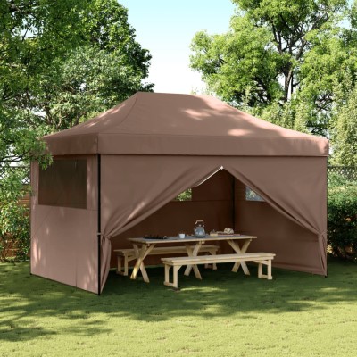 A wooden tent with 4 side...