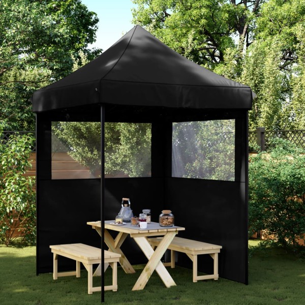 A commemorative tent with 2 side walls, black
