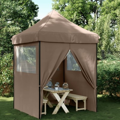 A wooden tent with 4 side...