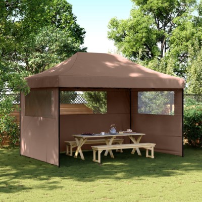 A wooden tent with 3 side...