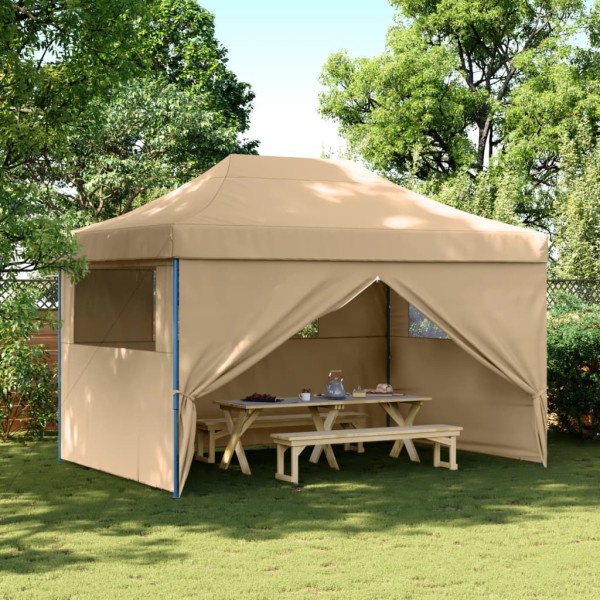 A commemorative tent with 4 side walls, sand