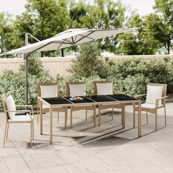 Table with glass top, sand, polyrattan and glass