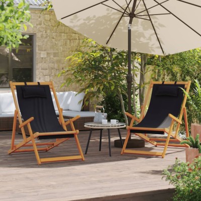 Folding beach chairs, 2...