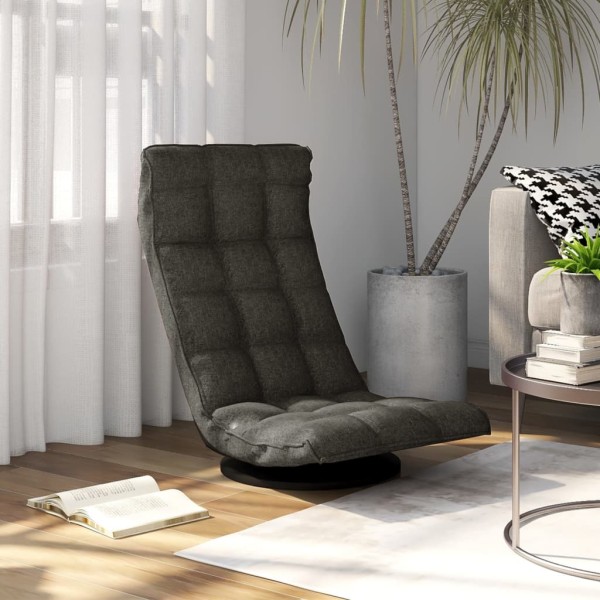 A swivel chair is placed on the floor, dark gray, fabric