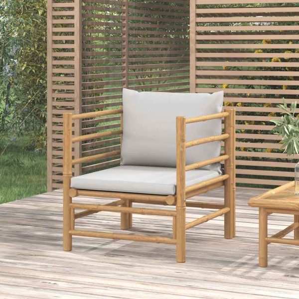 Garden sofa section with light gray cushions, bamboo
