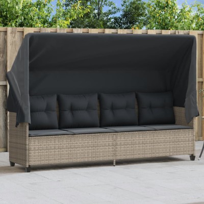 Sun lounger with canopy and...