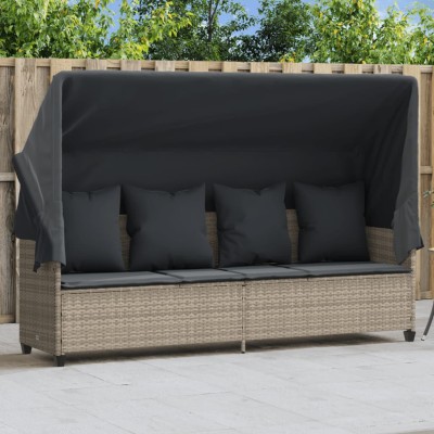 Sun lounger with canopy and...