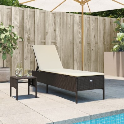 Sun lounger with table and...