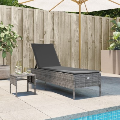 Sun lounger with table and...