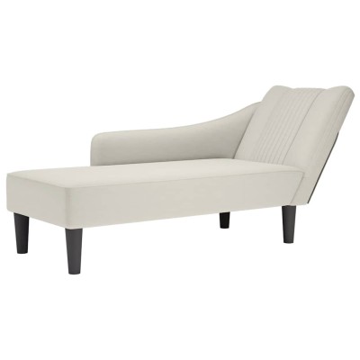 Lounger with armrest on the...