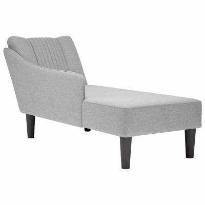 Lounger with armrest on the...