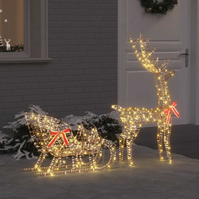 Reindeer pulling sled with...